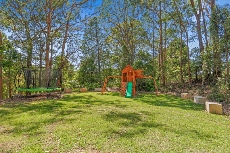 Treetop Acreage with Tennis Court